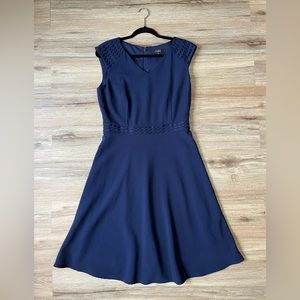 Size 8. Blue fitted at waist but flowy at legs dress. Alex Marie.
